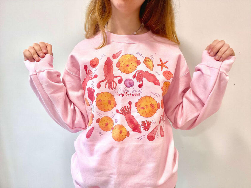 Puffer fish and squids patterned sweatshirt.