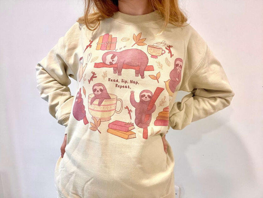 Sloth bookish sweatshirt.
